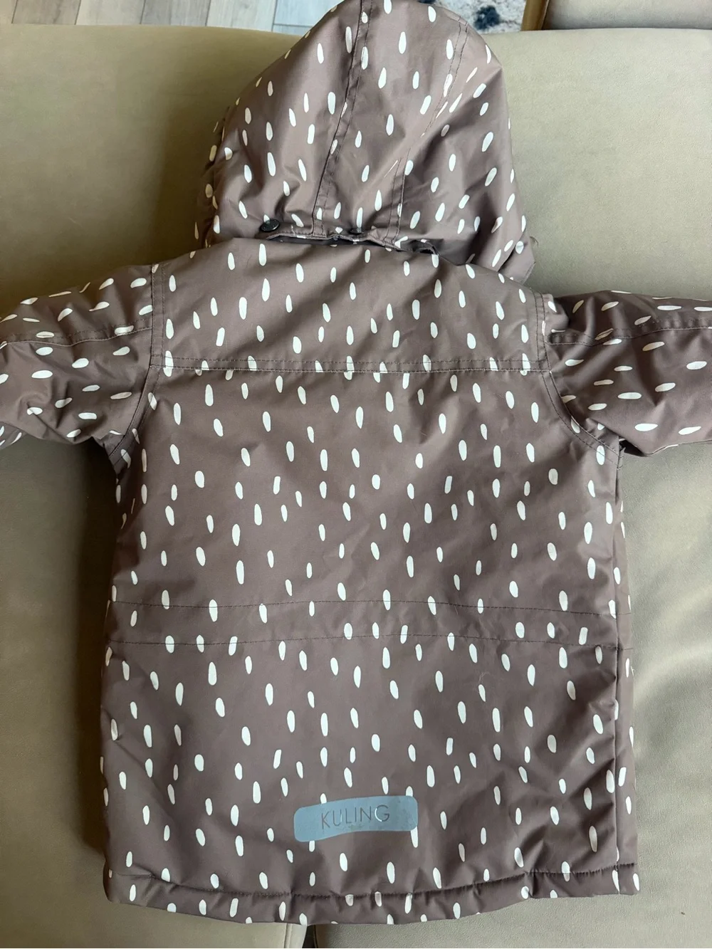 Kuling Brown Coat with White Dot Accents